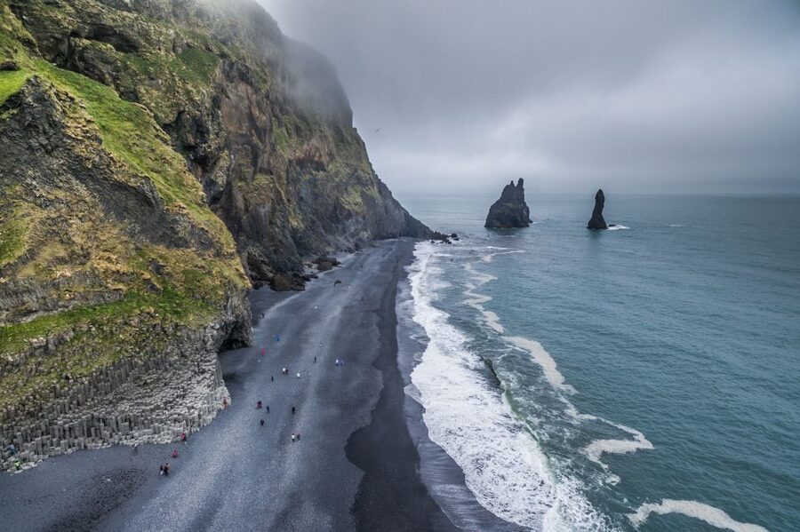 Reykjavik: Glacier Hike & South Coast Day Tour - Seljalandsfoss: a waterfall with a rear view