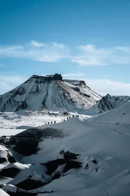 Reykjavik: Katla Ice Cave & South Coast Waterfalls Tour - Vík marks the change from coach to adventure