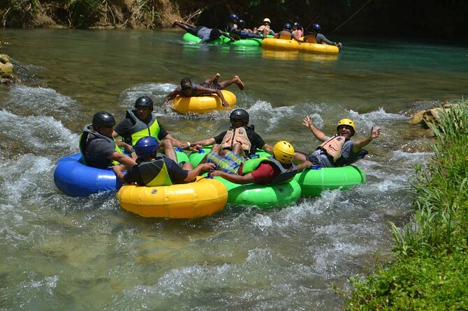 River Rapids Waterfalls Tubing and Beach Adventure with Transport - From Montego Bay to the Rio Bueno