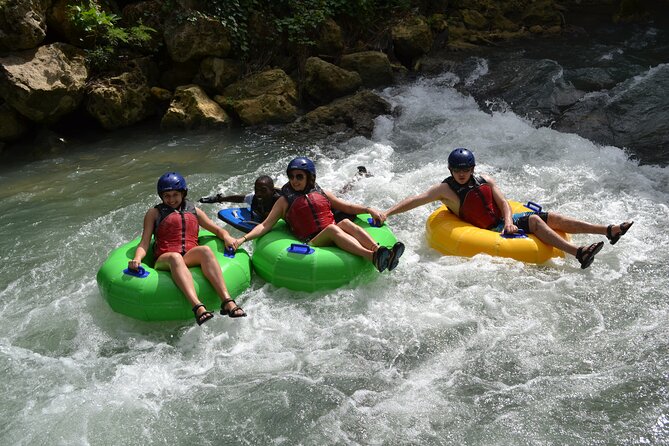River Rapids Waterfalls Tubing and Beach Adventure with Transport - The raft section is an important detail