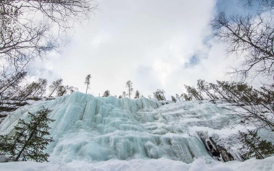 Rovaniemi: Korouoma Canyon and Frozen Waterfalls Tour - Hiking between cliffs, rapids, and frozen falls