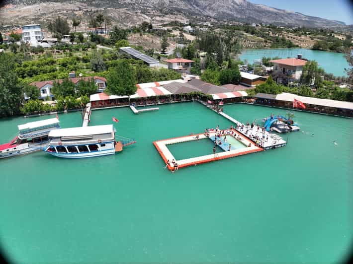 Side: Guided Tour and Electric Catamaran Cruise, Waterfall - Orange Groves and the Turkish Village House