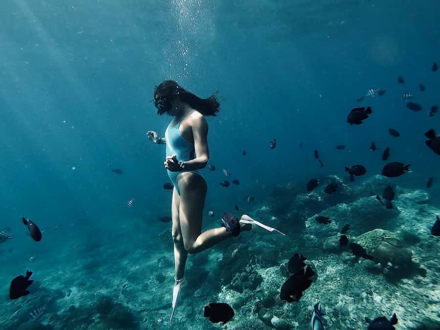Snorkeling at Blue Lagoon, Tanjung Jepun and Waterfall - Boarding the traditional boat