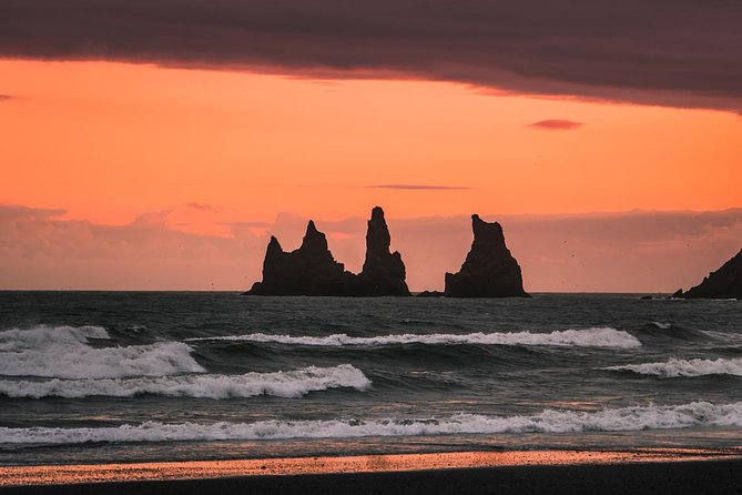South Coast Day Tour Black Sand Beach & Waterfalls from Reykjavik - Skogafoss and the stairway above the falls
