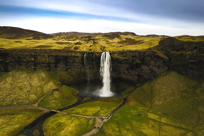 South Coast, Waterfalls and Black Sand Beach (Small Group Tour) - Vik offers a short pause and a wide coastal view
