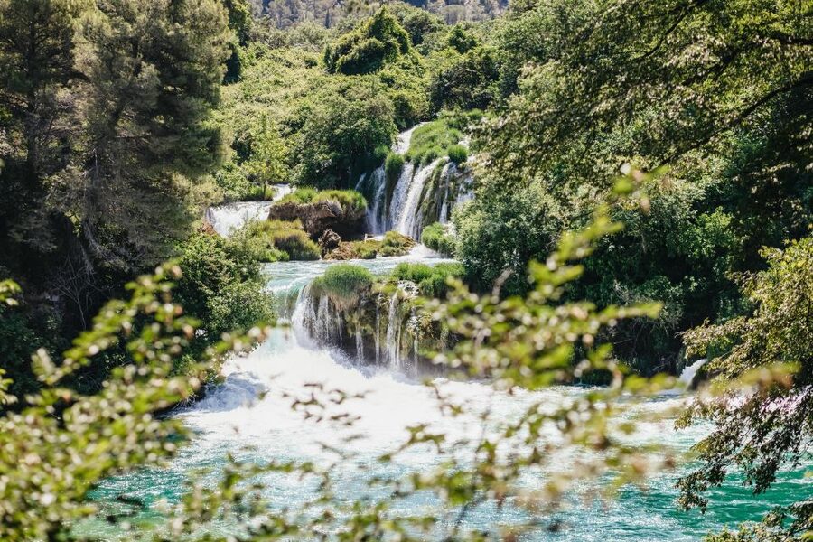 Split: Krka Waterfalls Trip with Boat Cruise and Swimming - Walking the Skradinski Buk paths