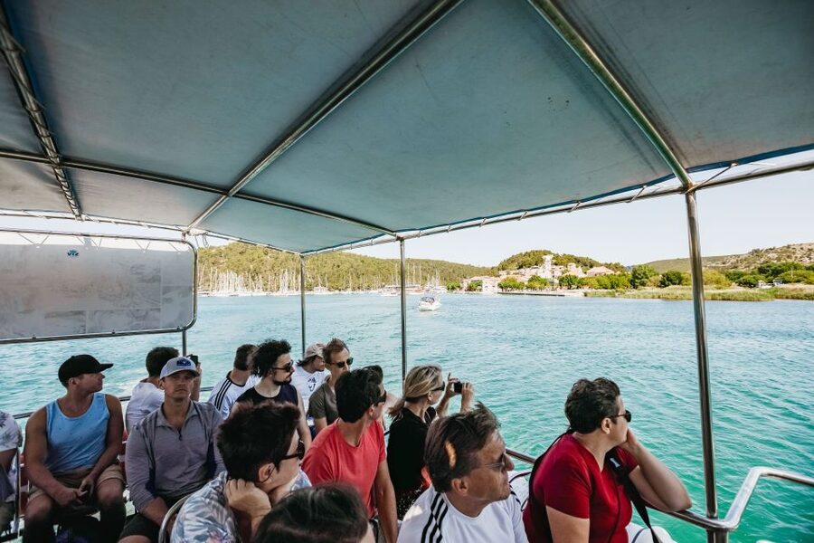 Split: Krka Waterfalls Trip with Boat Cruise and Swimming - Guides, timing, and the human side of the tour