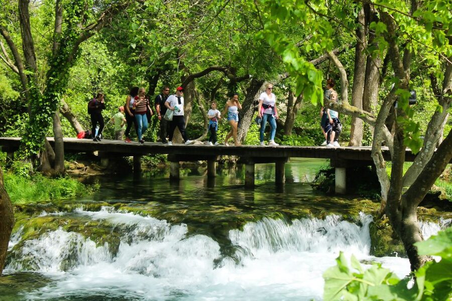Split: Krka Waterfalls With Boat Cruise, Wine and Olive Oil - Skradinski buk and its wooden walkways