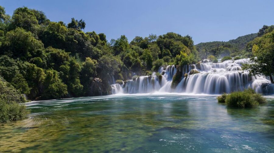 Split: Krka Waterfalls With Boat Cruise, Wine and Olive Oil - Old mills, stone houses, and Europe’s first hydroelectric power station