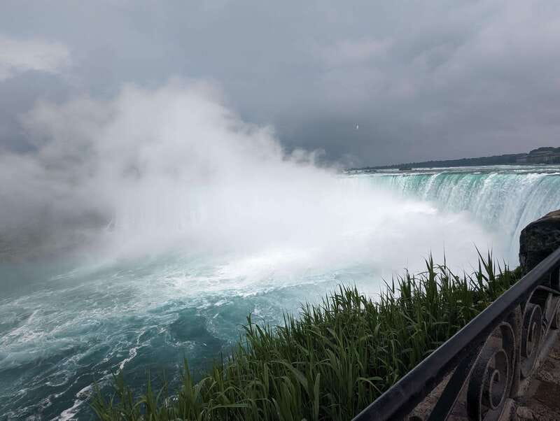 Toronto: Niagara Falls Day Tour with Boat Tour Option - First sight of the Canadian Horseshoe Falls
