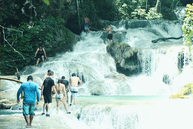 Tour to Copalitilla Magical Waterfalls from Huatulco with admission included - Swimming, Rocks, and the Right Footwear