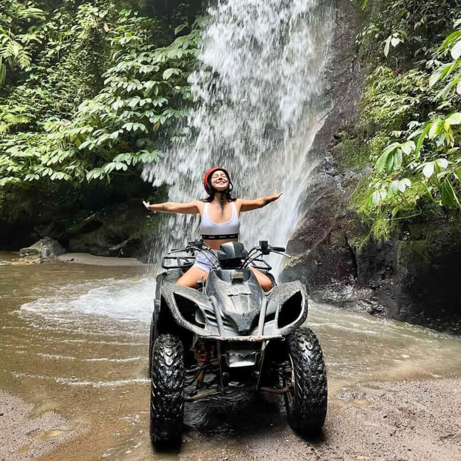 Ubud Bali: Kuber ATV Quad Bike with Long Tunnel & Waterfalls - Riding through the waterfall