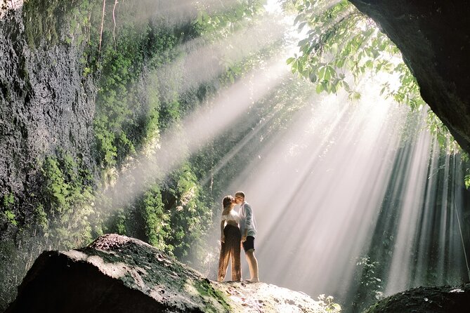 Ubud Tour with Monkey Forest Waterfalls Temples and More - Cooling off at Tegenungan Waterfall