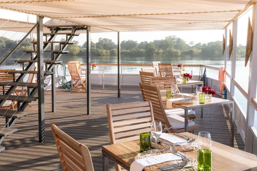 Victoria Falls: Dinner Cruise on the Zambezi River - Sunset on the Zambezi, from warm light to dark water