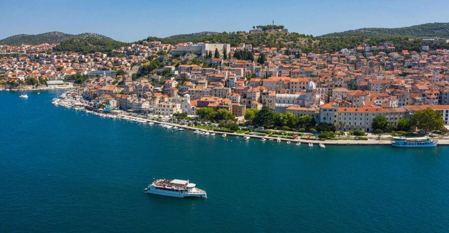 Vodice: Krka Waterfalls National Park Boat Tour - St Nicholas Fortress and the approach to Šibenik